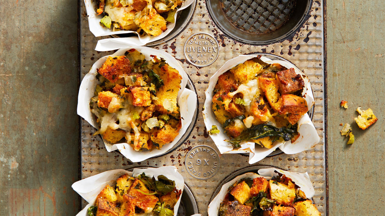A golden and crispy stuffing muffins filled with toasted bread cubes, herbs, and veggies