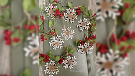 The DIY frosted wood snowflake ornaments add warmth and earthiness to Christmas celebrations