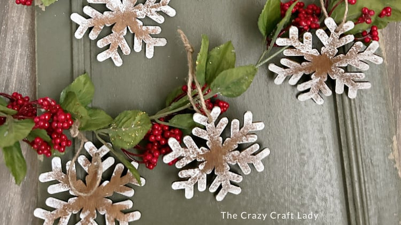 Your DIY Frosted Wood Snowflake Ornaments are ready