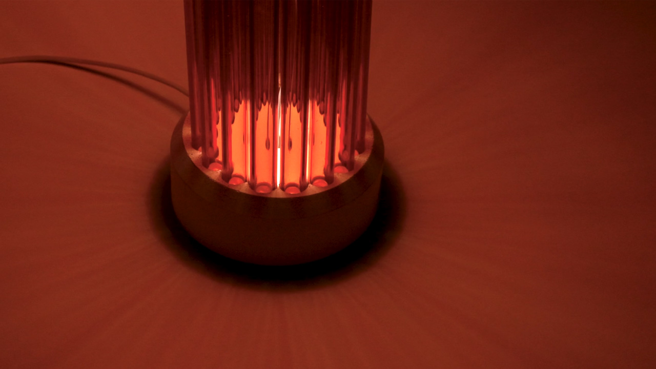 When turned on, the lamp gives a soft glow that creates a subtle lighting effect through the glass.