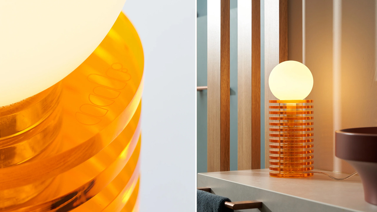 The translucent acrylic disc of the Lampake table lamp looks neat and bulb glows up slowly.