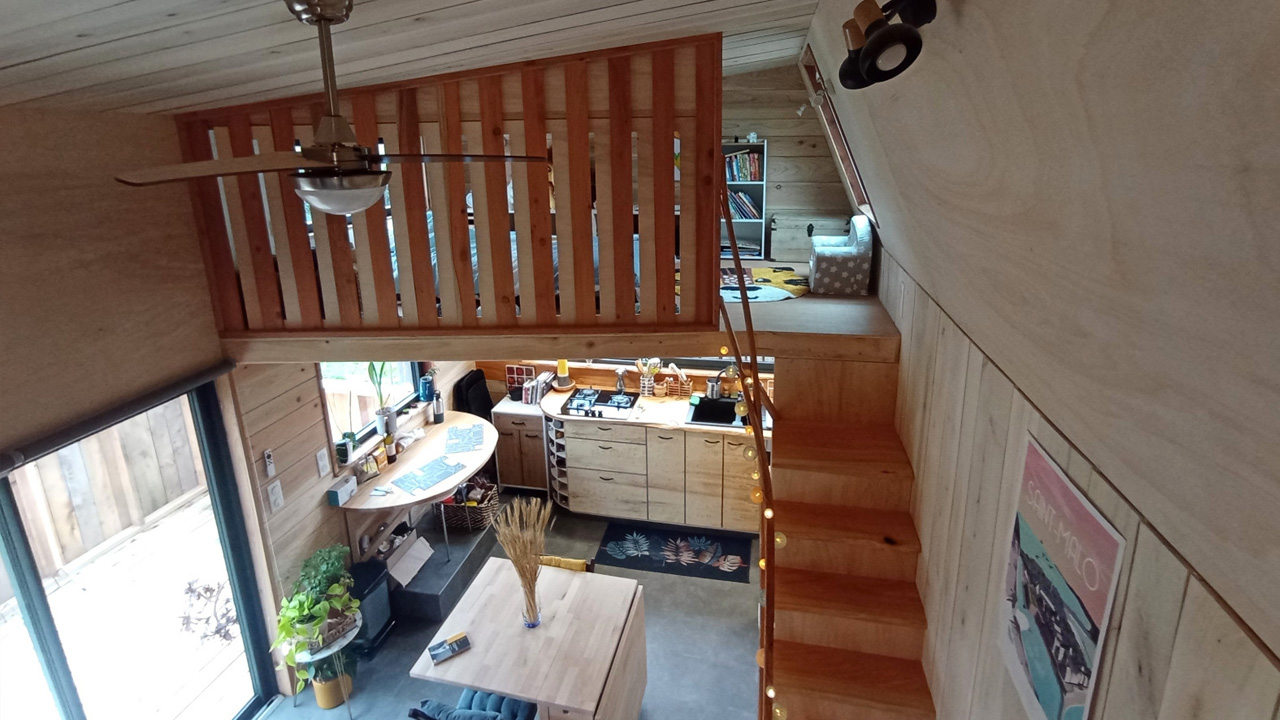 The mezzanines have a protective wooden slat railings.