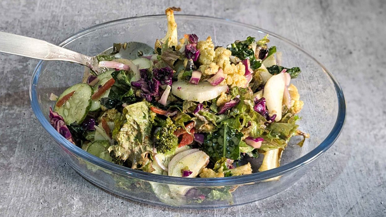 This protein-packed recipe is light, flavorful and abundant in healthy vegetables like kale, broccoli, lettuce, carrot, radish and more.