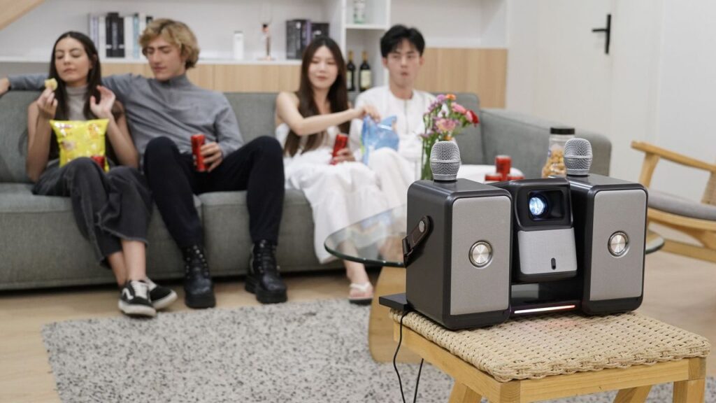 Audiray One Combines 4K Projector, Two 60W Speakers, and a of Pair Wireless Mics in One Unit Audiray One - Portable Projector With Mini Theater