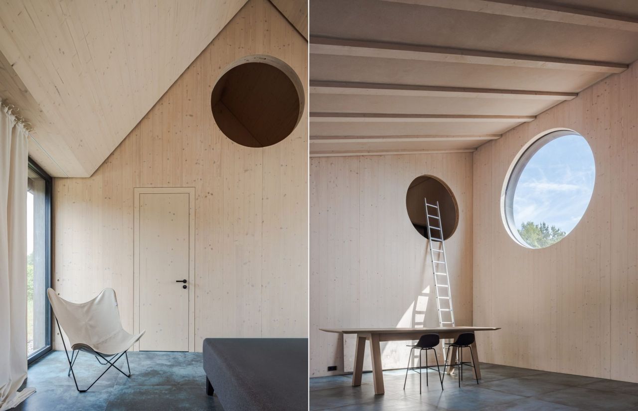 Pāvilosta House’s Curved Slate Roof Looks Like as if it Shaped by Sea Air and Water