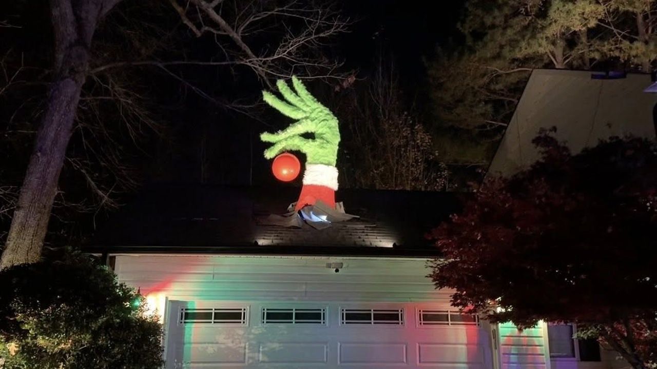 Roof-breaking Grinch hand by Isaac Alexander - 2