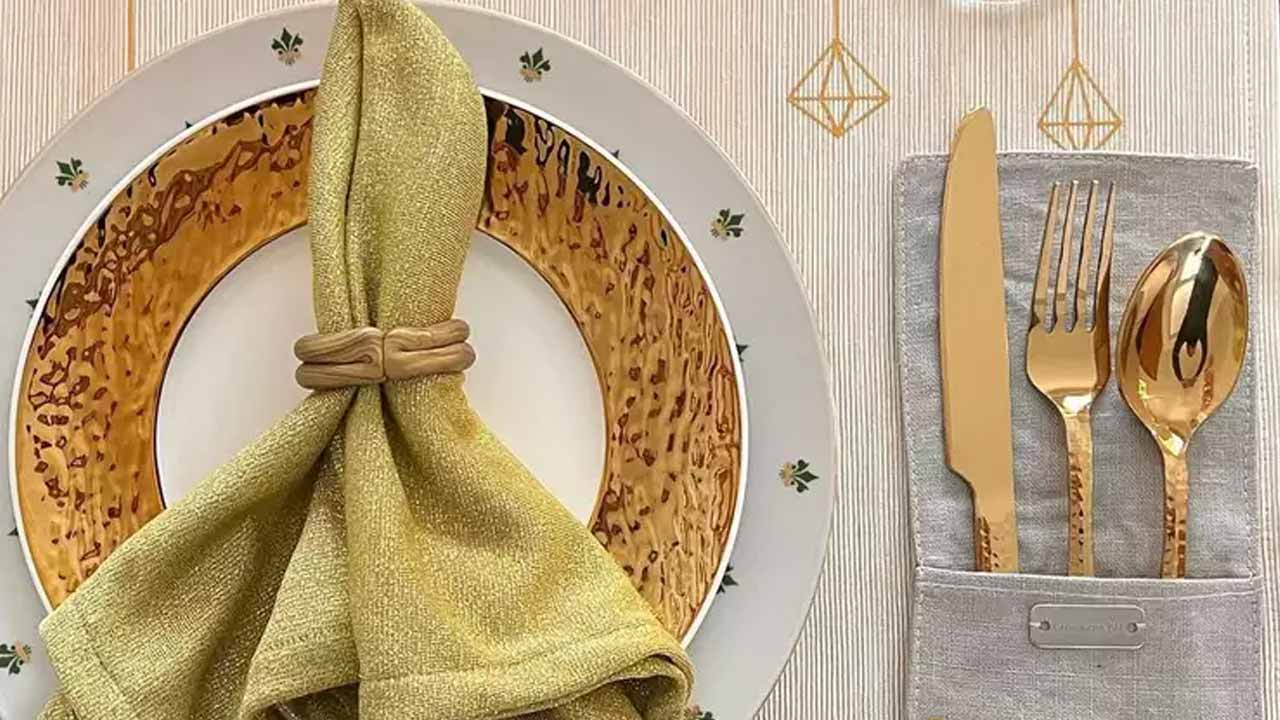 gold ring napkin fold