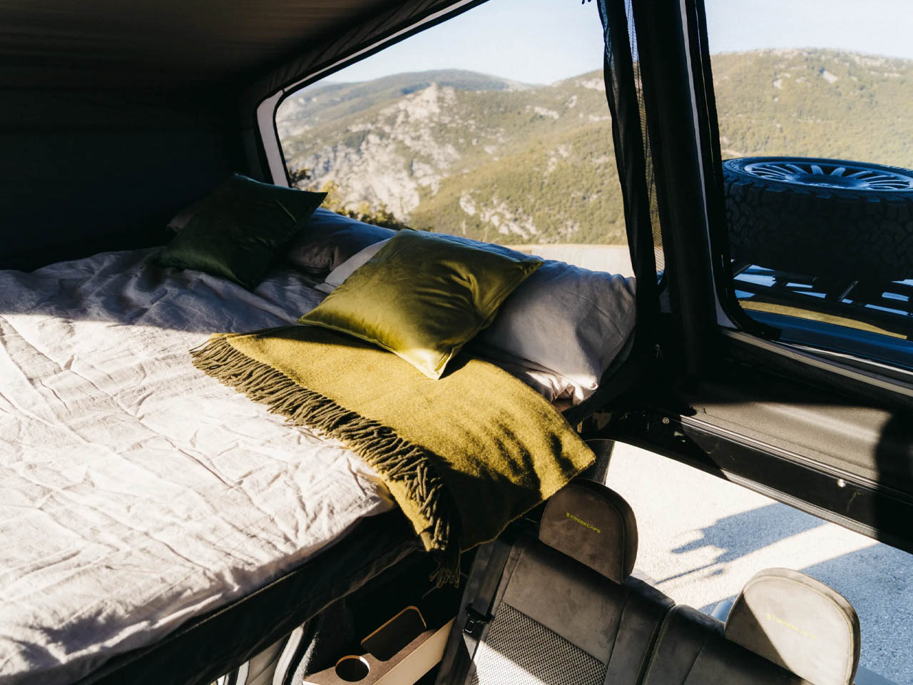 Freescape Camper Van With Side-Expanding Inflatable Pop-Up Roof Tent- sleeping area 