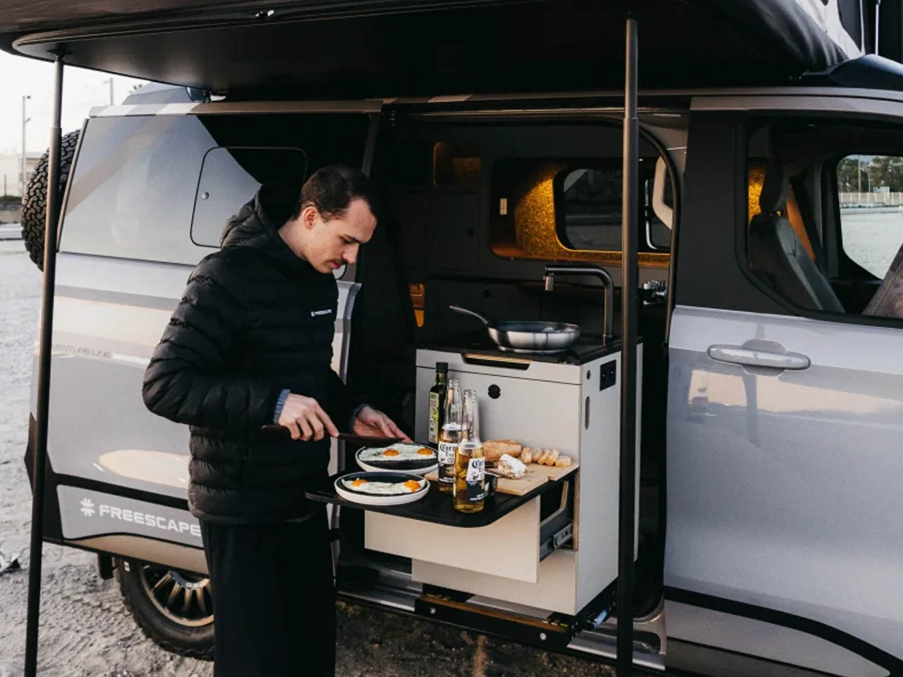 Freescape Camper Van With Side-Expanding Inflatable Pop-Up Roof Tent  - outdoor kitchen 