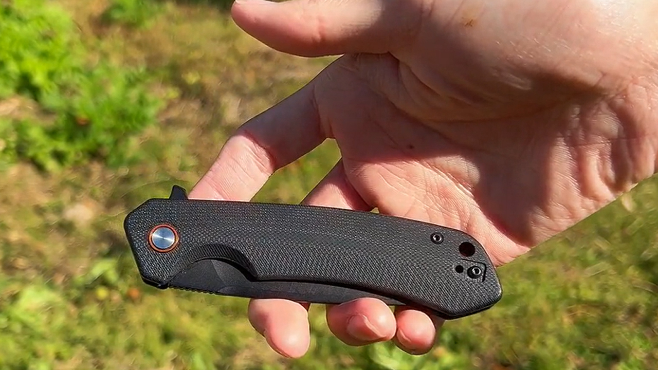 Knight Fang Titanium EDC Knife has smooth one-hand opening mechanism