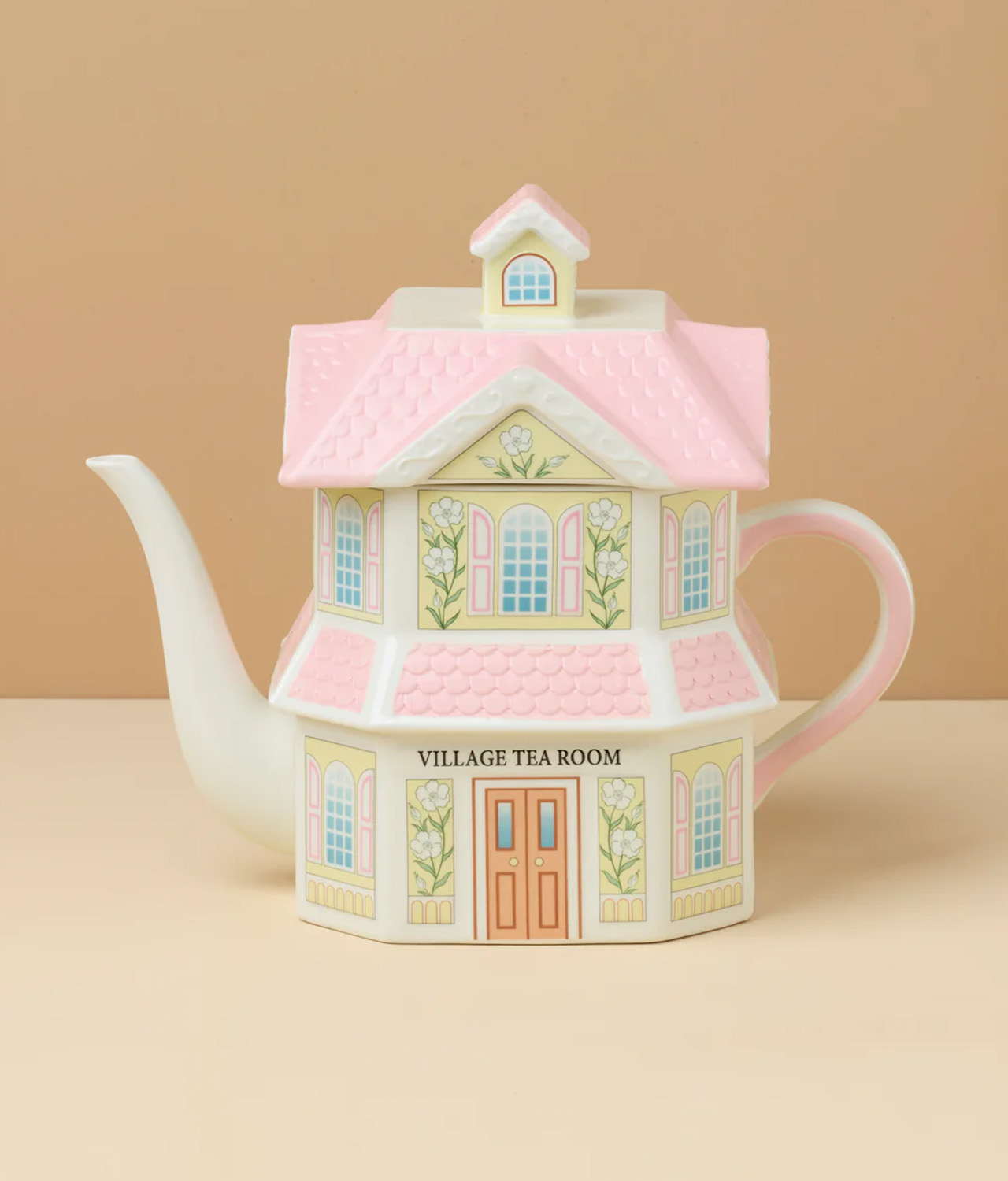 Lenox Spice Village Teapot is shaped like storybook house