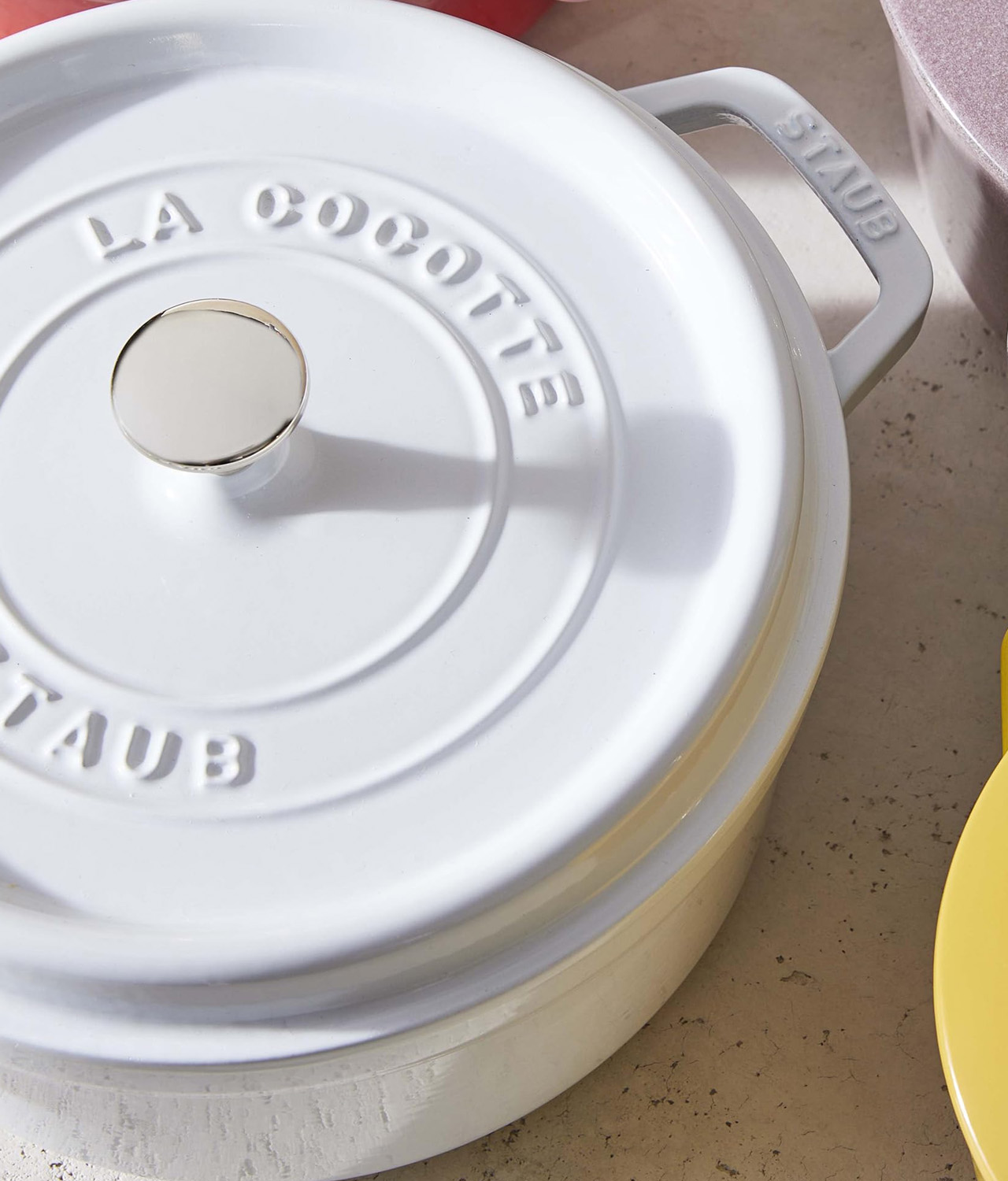 The French-made cookware has enameled finish