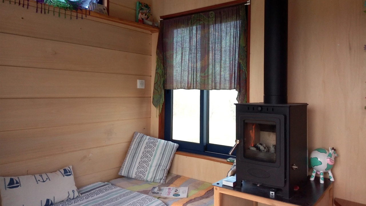 Tiny Birdy Tiny House living area fireplace