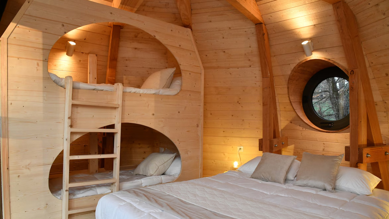 four people can easily sleep in the spacious bedroom