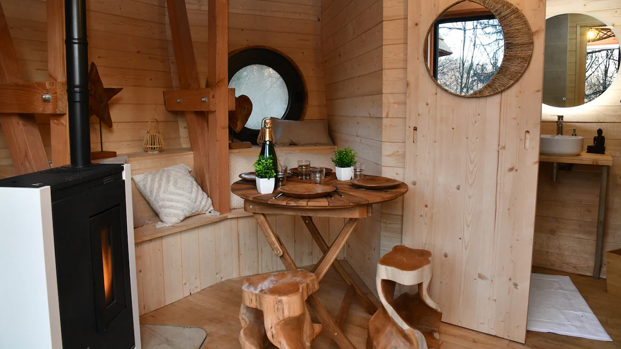 The designer chairs of the dining table look like mini sculptures