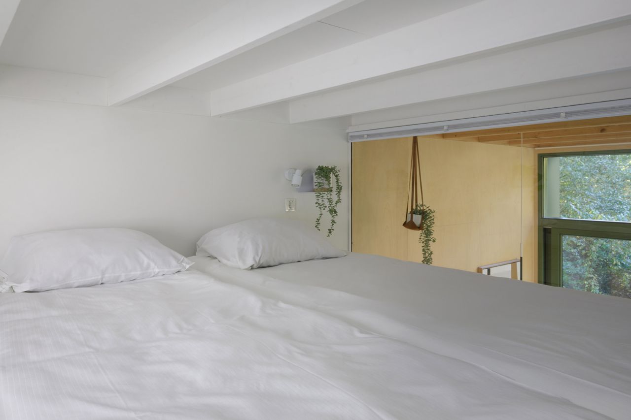 Lounge Lodge Minimalist Holiday Retreat in Netherlands Blends Into its Forest Environment