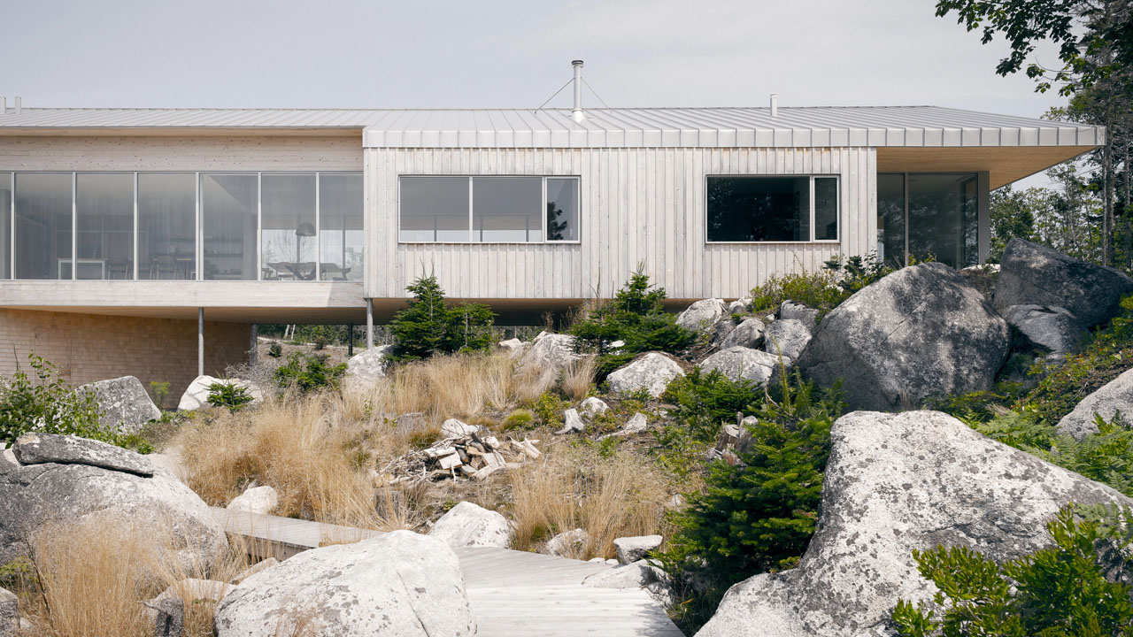 The East Residence seamlessly blends with the wild nature of coastal shoreline