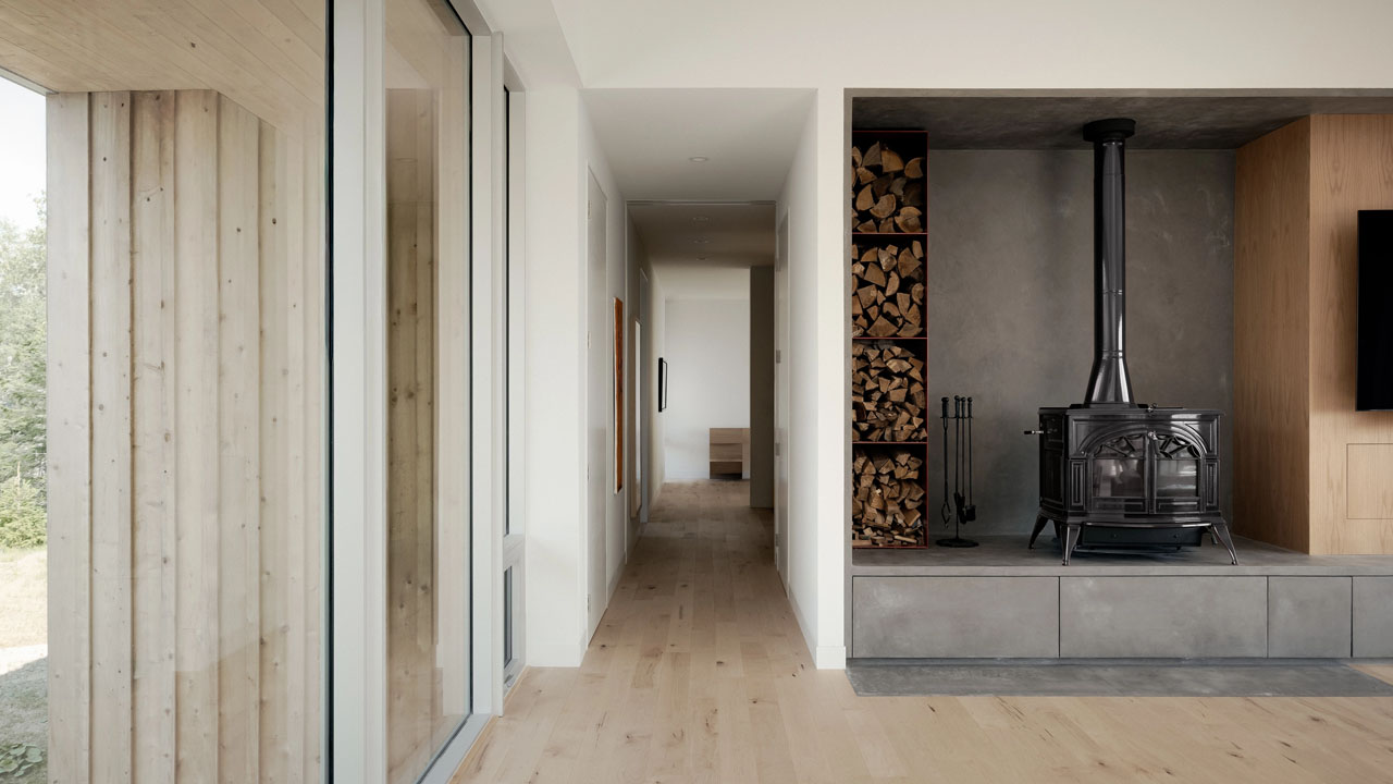 The warm timber cladded interior of East River Residence