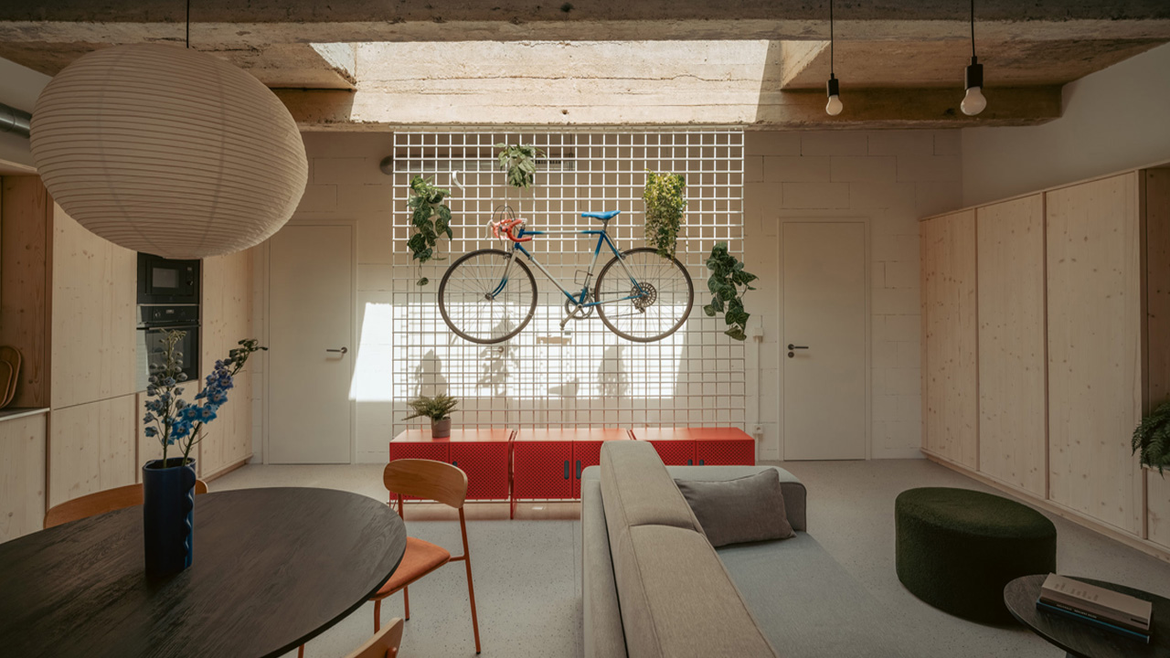 The bicycle mounted against the grid looks like sculptural piece