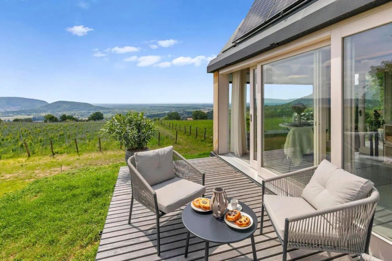 Cabin Devín by Archekta studio and Ark-Shelter Features Folding Terraces to Reveal Glass Door to Bring Outdoors In