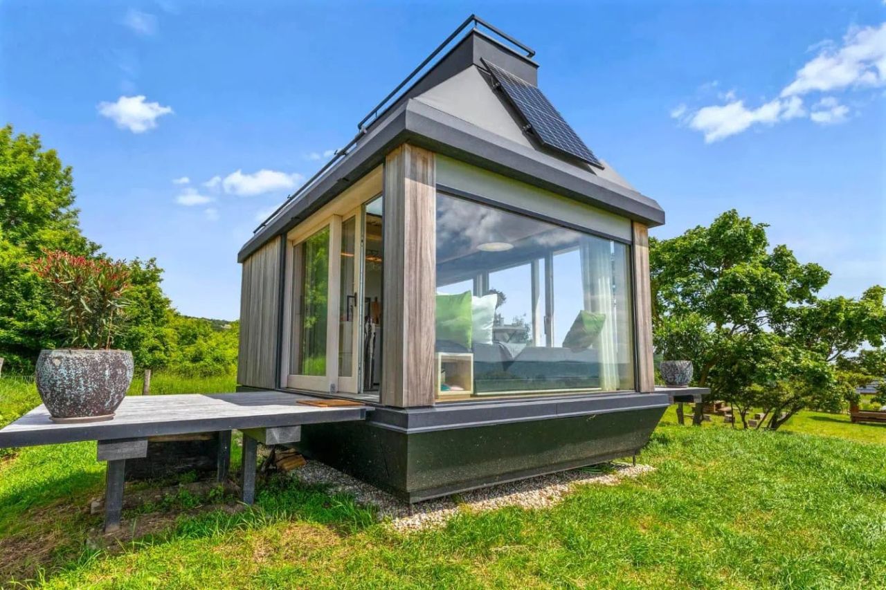 Cabin Devín by Archekta studio and Ark-Shelter Features Folding Terraces to Reveal Glass Door to Bring Outdoors In