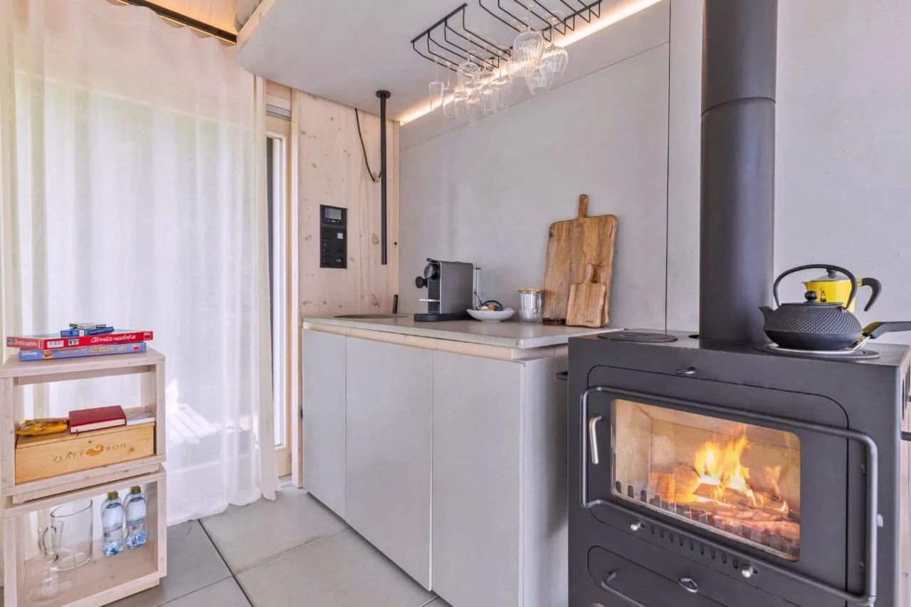 Cabin Devín by Archekta studio and Ark-Shelter Features Folding Terraces to Reveal Glass Door to Bring Outdoors In