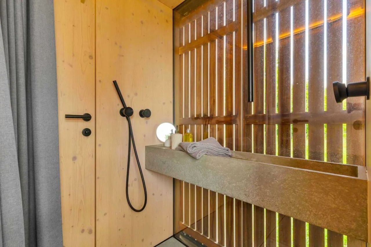 Cabin Devín by Archekta studio and Ark-Shelter Features Folding Terraces to Reveal Glass Door to Bring Outdoors In