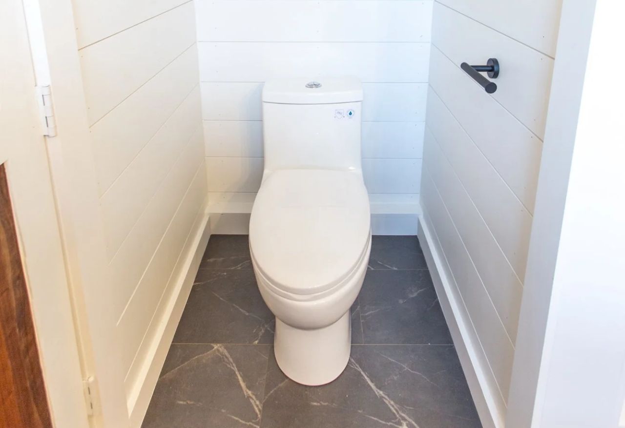 Toilet in Elderberry tiny home on wheels