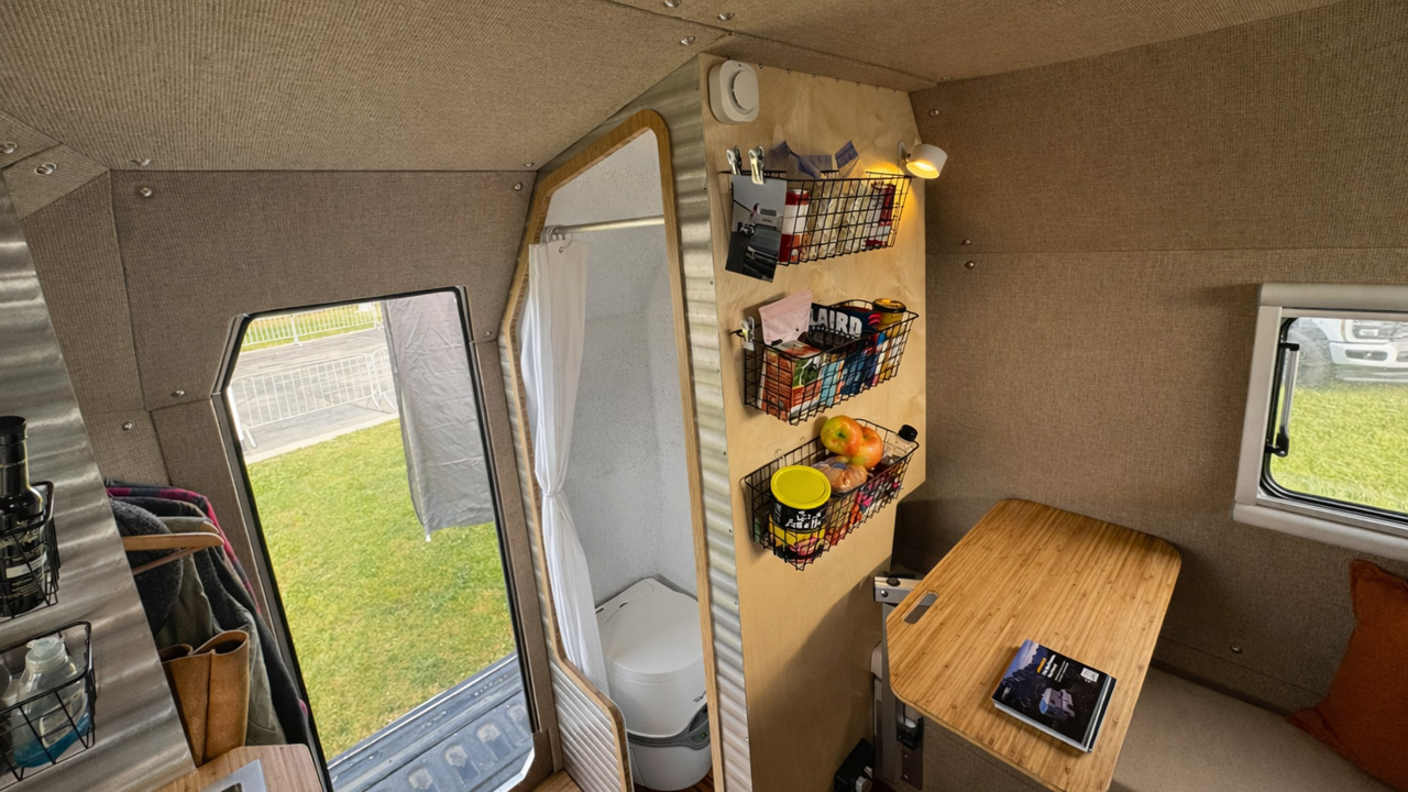 Kimbo 8 Aluminum Truck Camper - wet bathroom in rear