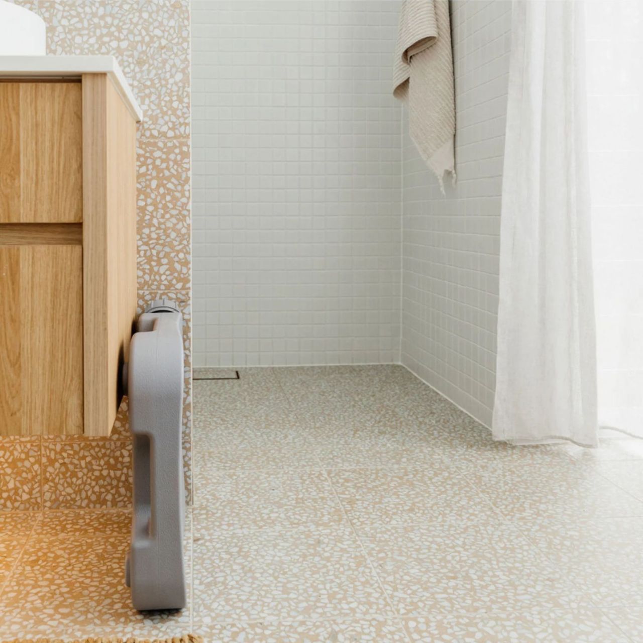 SEVAS Shower Water Catcher is Space-Saving and Convenient Alternative to Buckets