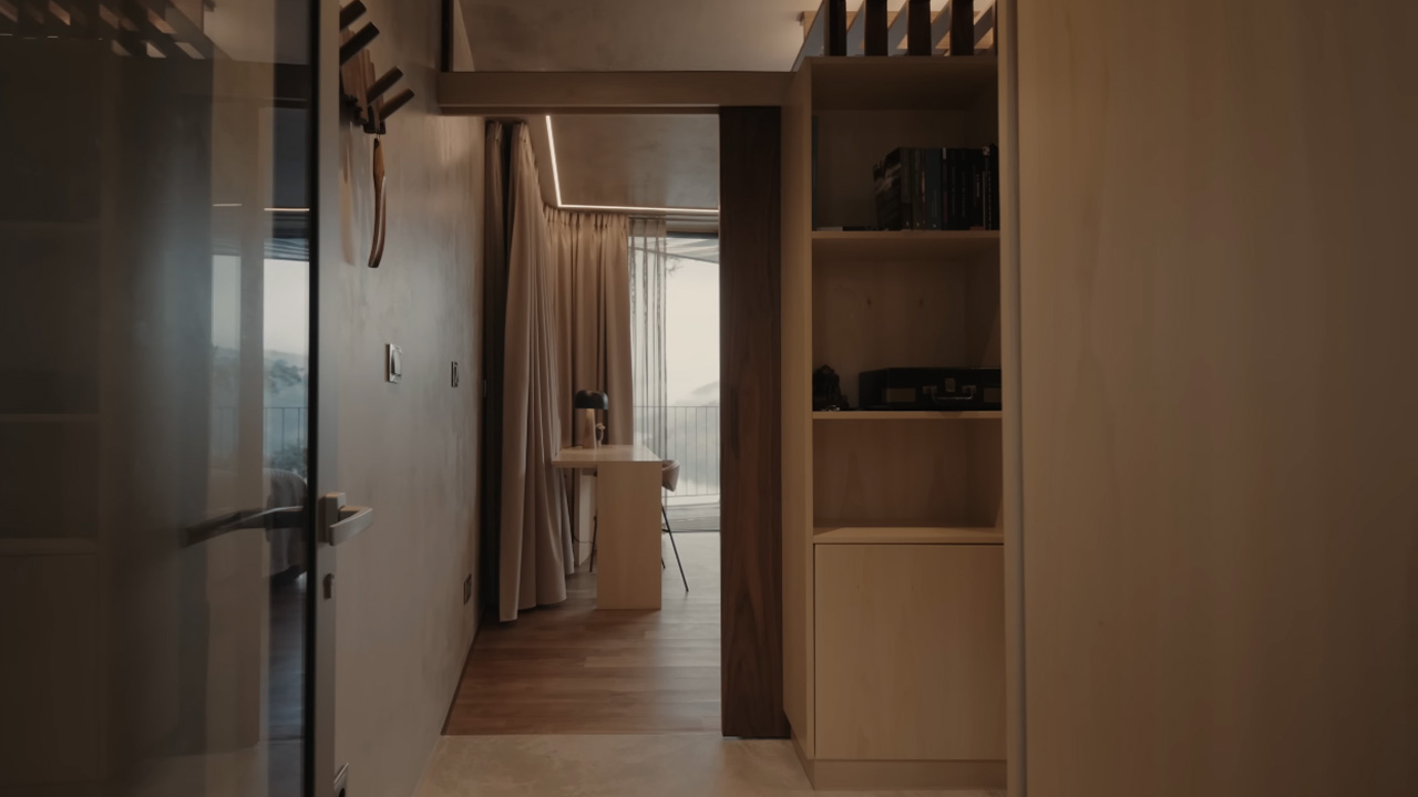 The interior has a through woodwork, creating a warm ambience