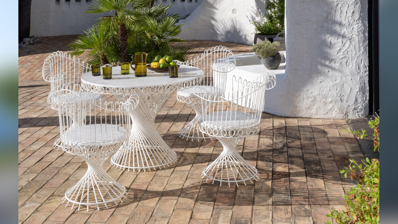 Antheor patio set by Mathieu Matégot adorn the terrace with its designer look