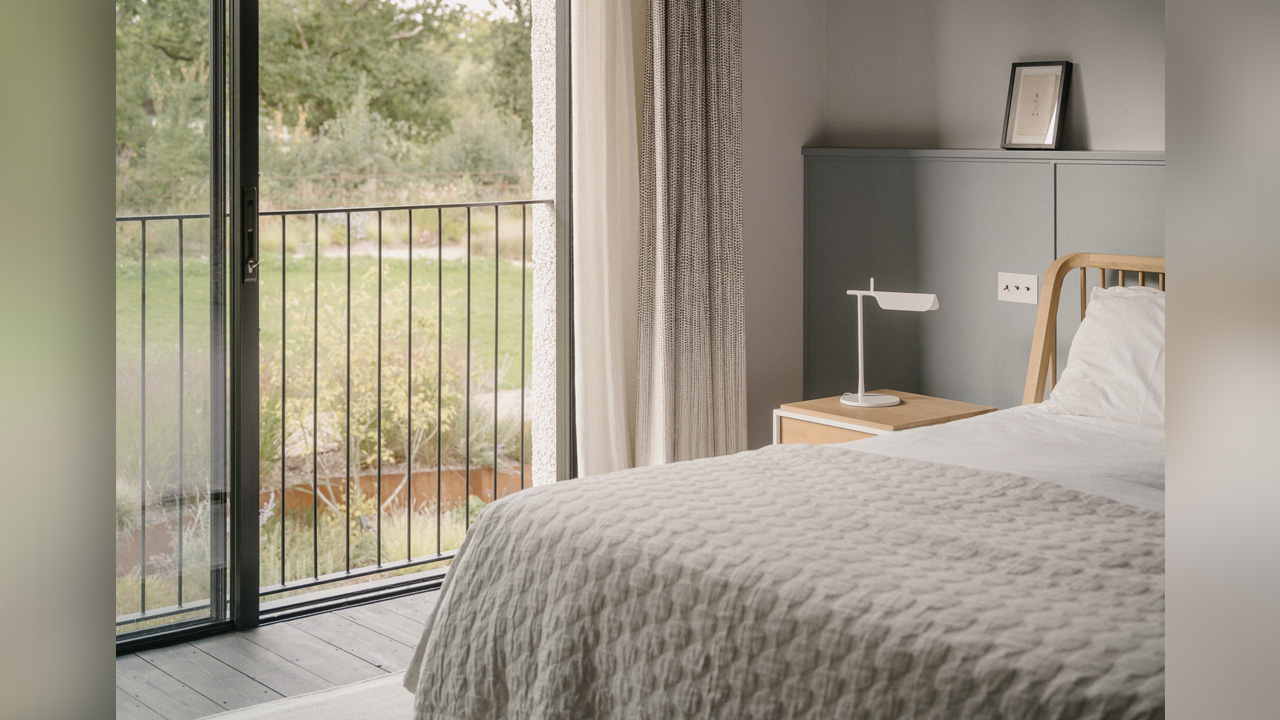 The upper floor has a comfy bedroom meeting privacy needs