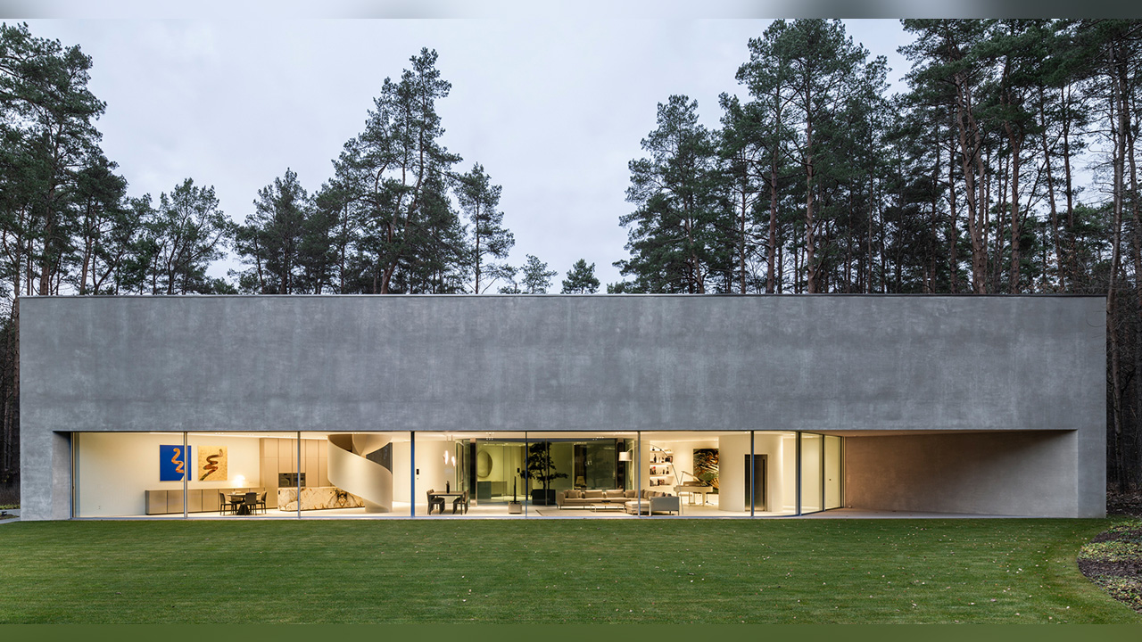 The Trim house quietly settles itself amid beautiful greenery