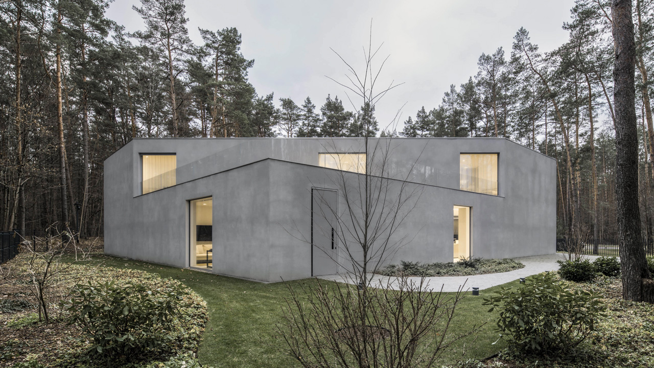 Lush garden envelops the Trim House