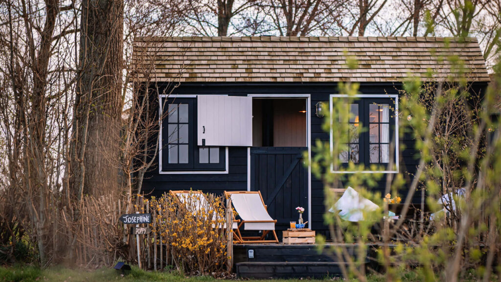 Tiny Poppy House Offers Intimate Glamping Experience For Couple in Middle of Lush Landscape