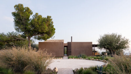 Villa Modda Restoring Rural Ruins with Earthen Elements Within Modern Shell