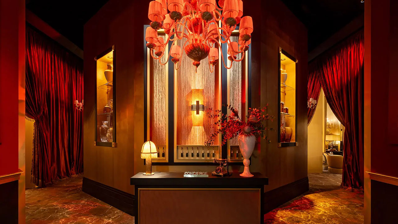 The theatrical installation feels like a movie set.