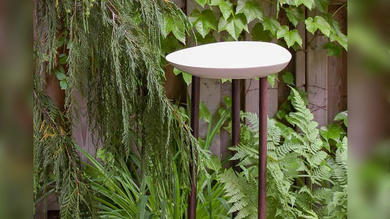 The Easy DIY Modern Birdbath has sleek and minimalist look