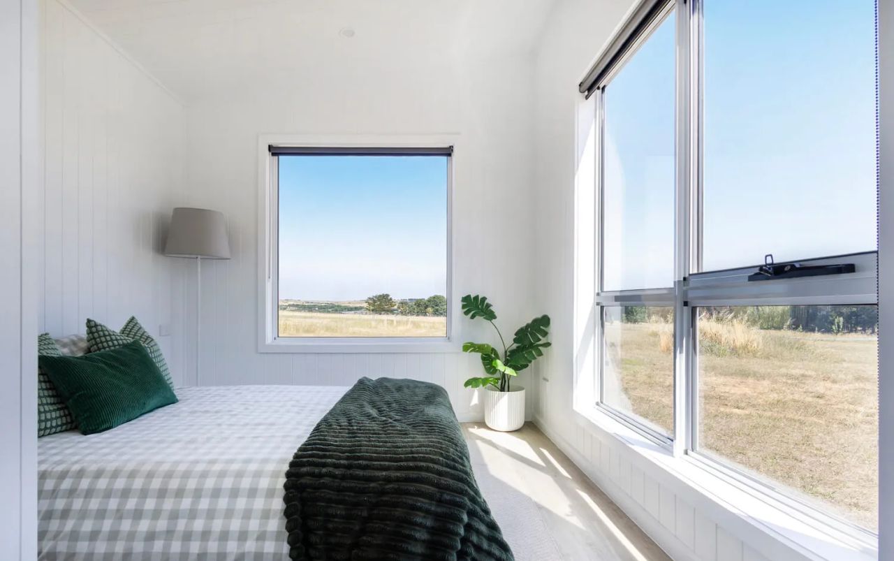 Bedroom of Esther tiny home on wheels