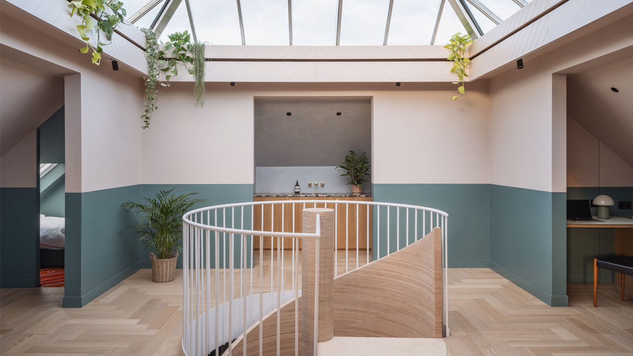 The spiraled staircase located beneath the pyramid skylight
