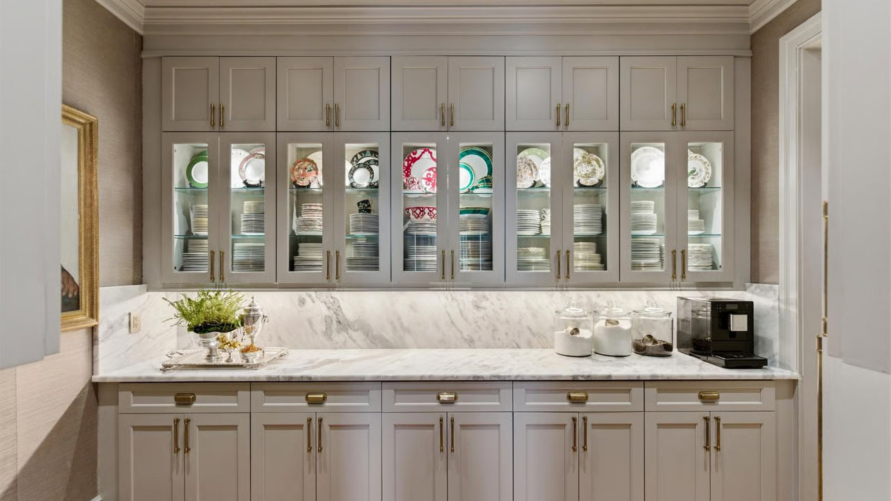 China plates and crockery displayed in the cabinetry