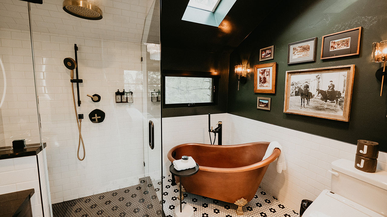 The shimmering copper clawfoot soaking tub.