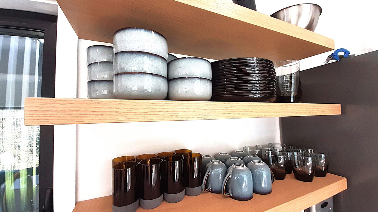 The floating shelves provide ample storage