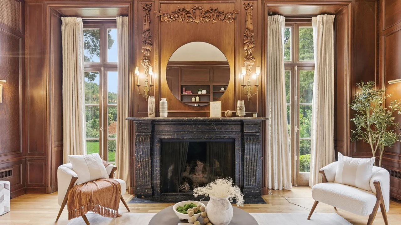 The owner of the house preserved the vintage dark fireplace