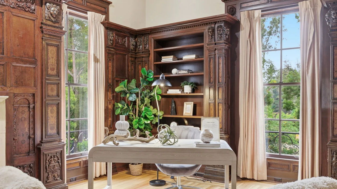 The wood-clad wall provide warmth and classic charm to the interior