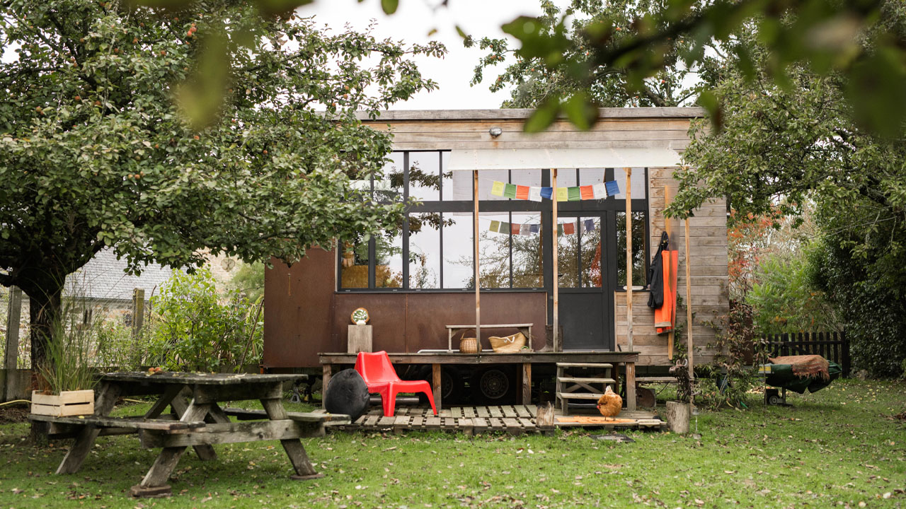 The small low porch leads to entrance