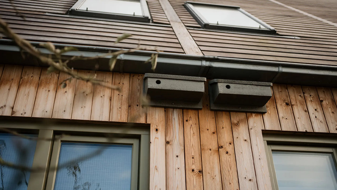 The gabled roof and breathable walls mimic the same traditional Dutch architecture