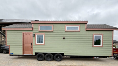 Two-Bedroom Dolphins Tiny House Savors Premium Finishes in 32 ft. Configuration Dolphins Tiny House on wheel in USA