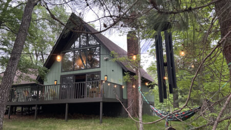 Enjoy Luxurious Lodge Coziness in Mid-Century A-Frame Northwood Cabin for $445,000